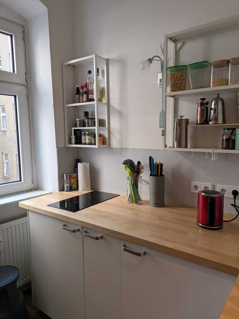 kitchen backsplash renovation shelving work surface countertop installation painting hanging wood handyman berlin fix it english speaking